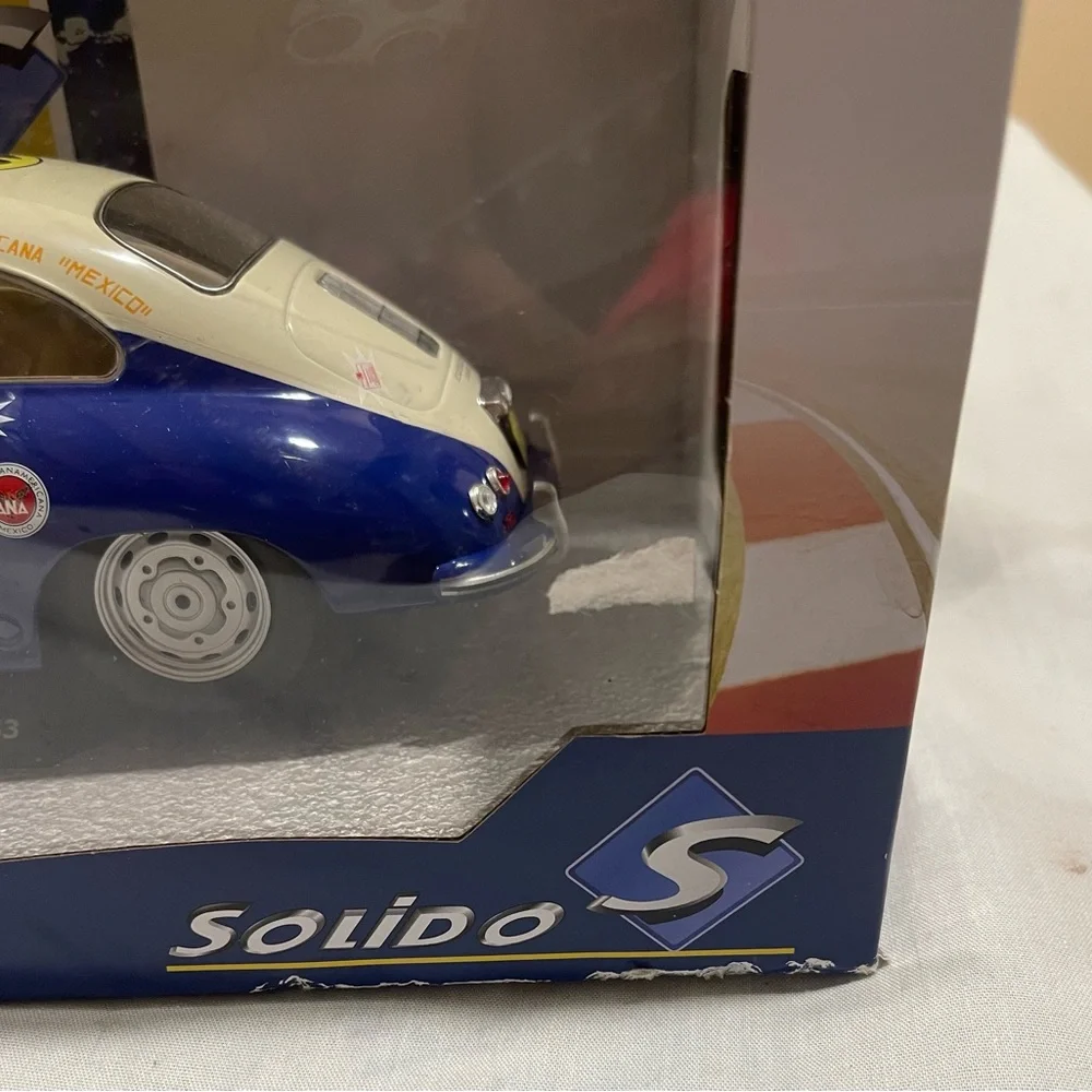 Solid Blue and White Toy Race Car collectible